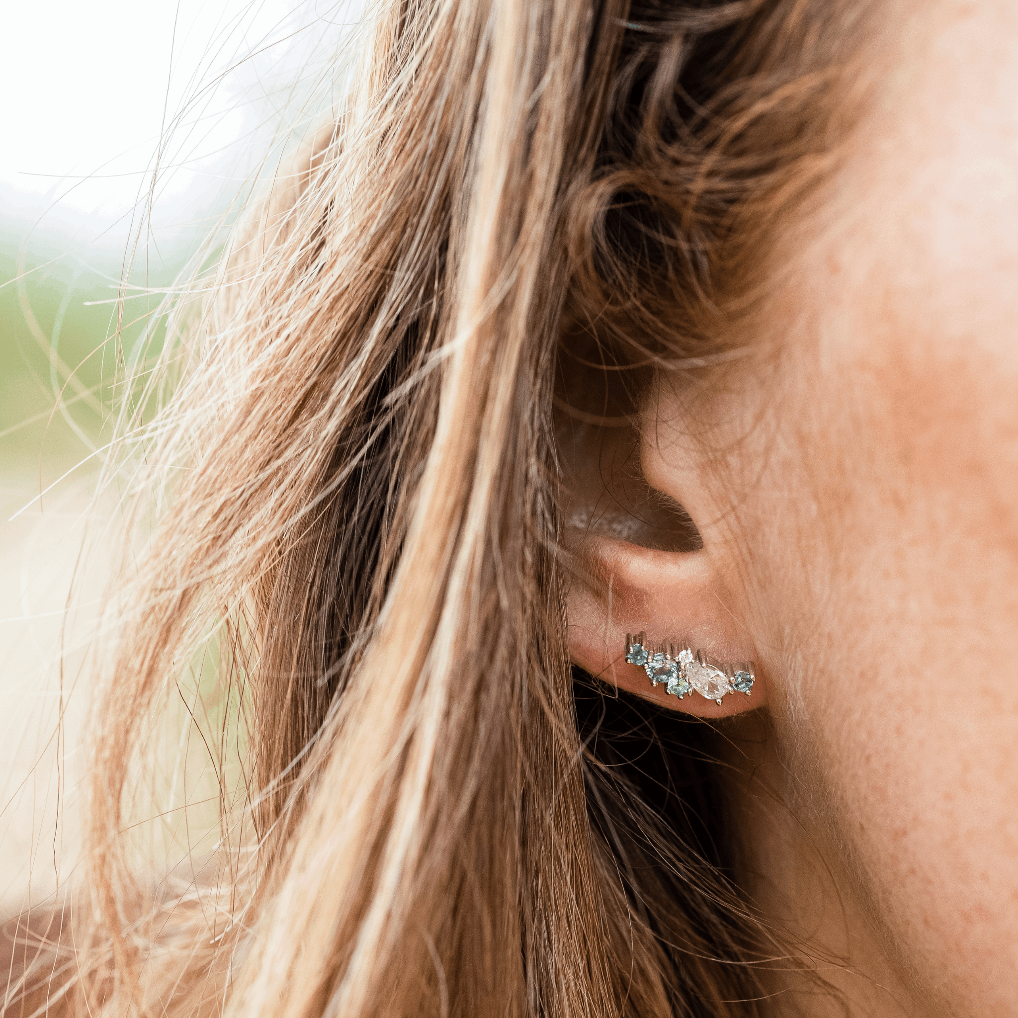 Contellation climber stud earrings blue green sapphire diamond and tourmaline gemstone cluster Claire Collinson Photography Emma Hedley Jewellery