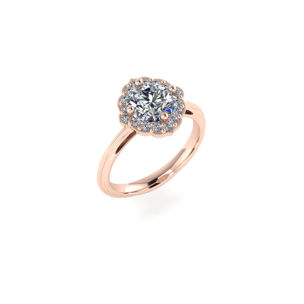 Luxury unique engagement rings in 18ct recycled rose gold with lab grown or natural diamonds vintage inspired mandala shaped halo ring artisan bridal jewellery by British designer Emma Hedley based in Newcastle upon Tyne looking.for something different