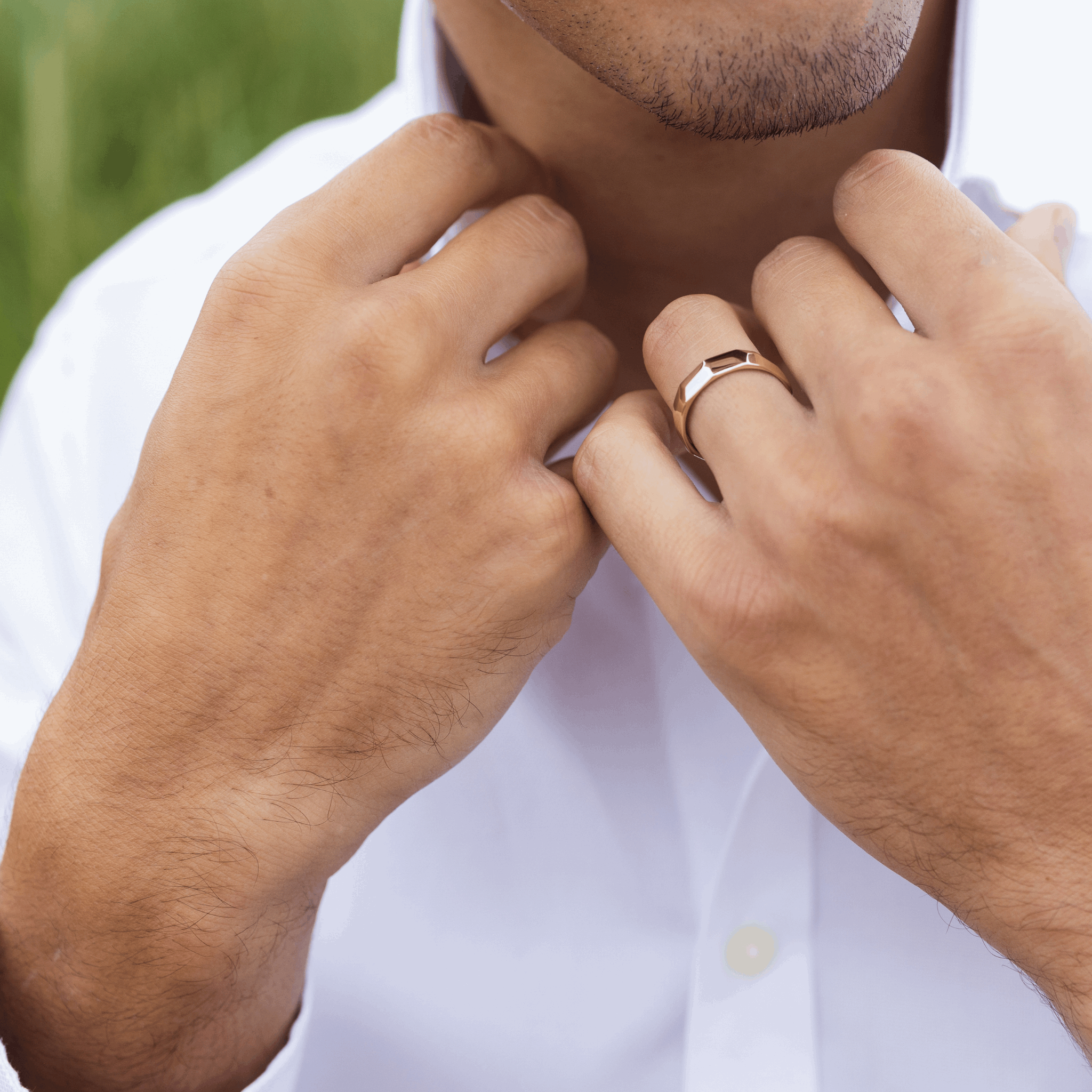 Facets 5mm textured recycled yellow gold unique wedding ring worn on a man's hand- Claire Collinson Photography for Emma Hedley Fine Jewellery