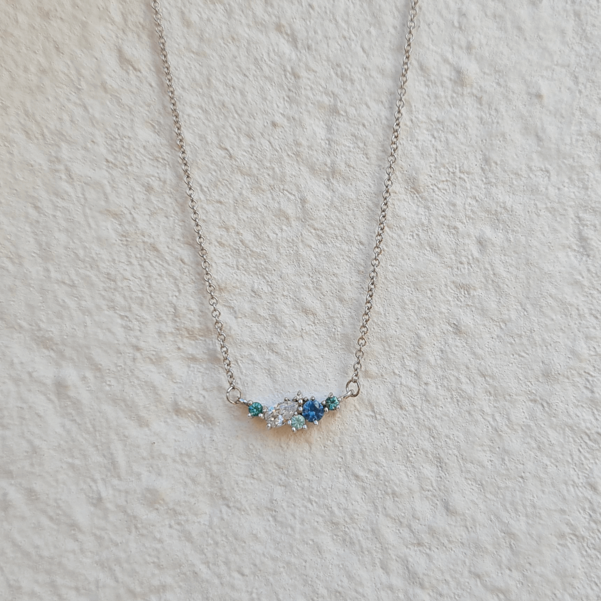 blue sapphire lab grown pear diamond cluster gemstone fine jewellery 18ct recycled white gold necklace pendant