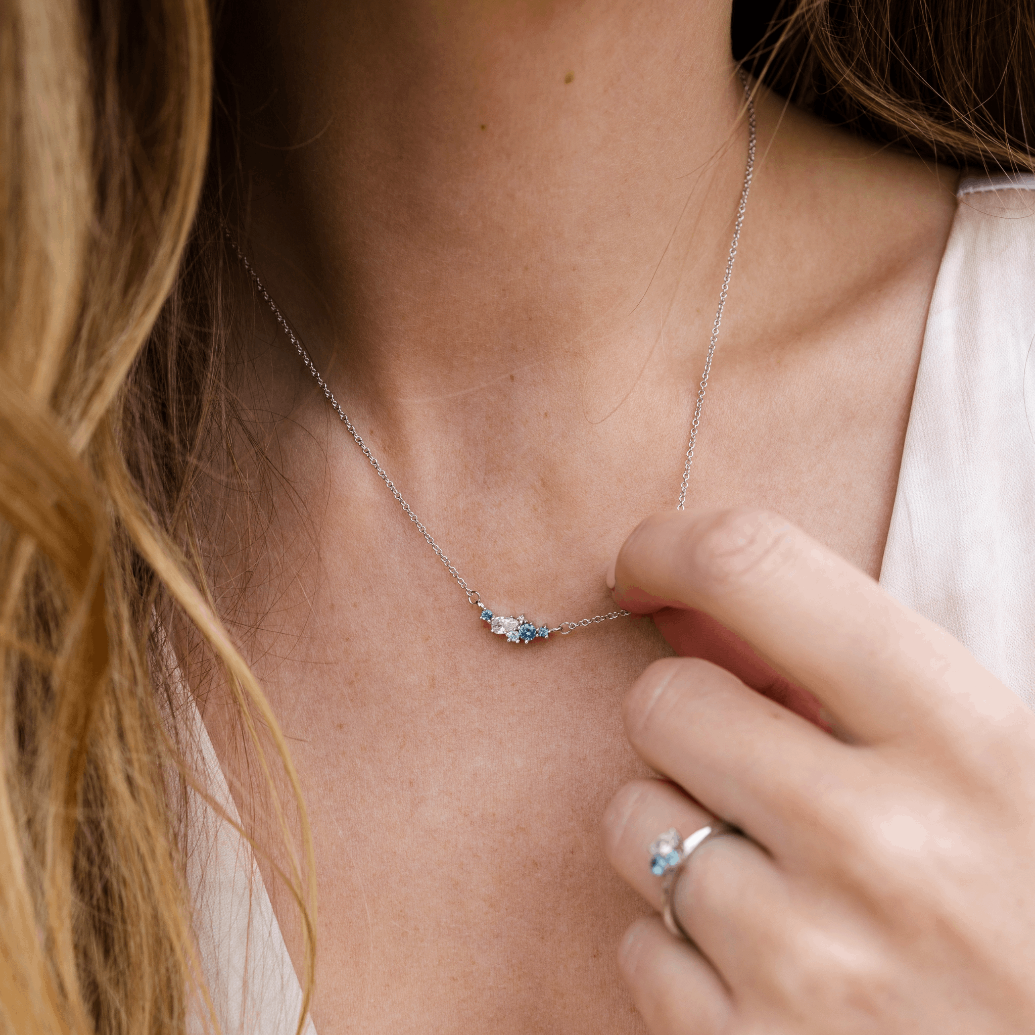 Ocean organic constellation pendant blue green sapphire tourmaline  cluster 6 stone white gold necklace Emma Hedley Jewellery Claire Collinson Photography Model Hannah Shaw