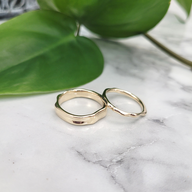 Ripple water inspired alternative contemporary wedding rings something different recycled or Fairtrade gold by custom jewellery designer Emma Hedley