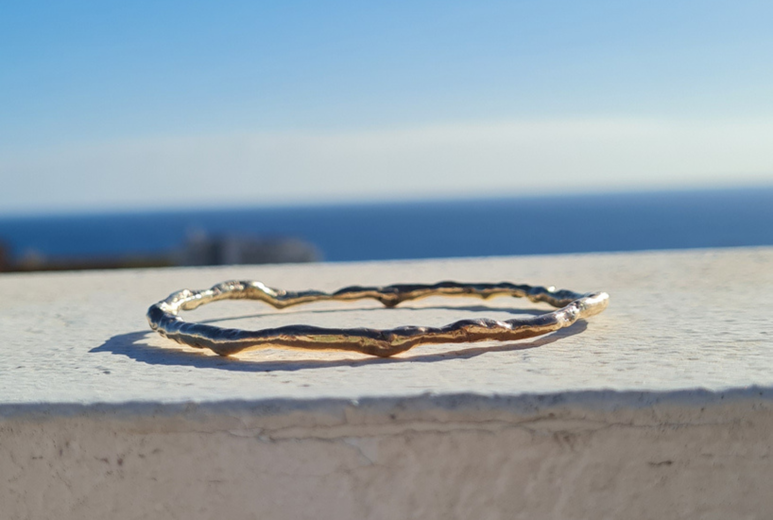 melted recycled gold bangle