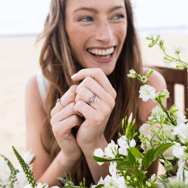 Emma Hedley Blossom lilac sapphire ethical rose gold wedding engagement shaped caress green and blue eternity rings Claire Collinson Photography Model Hannah Shaw 