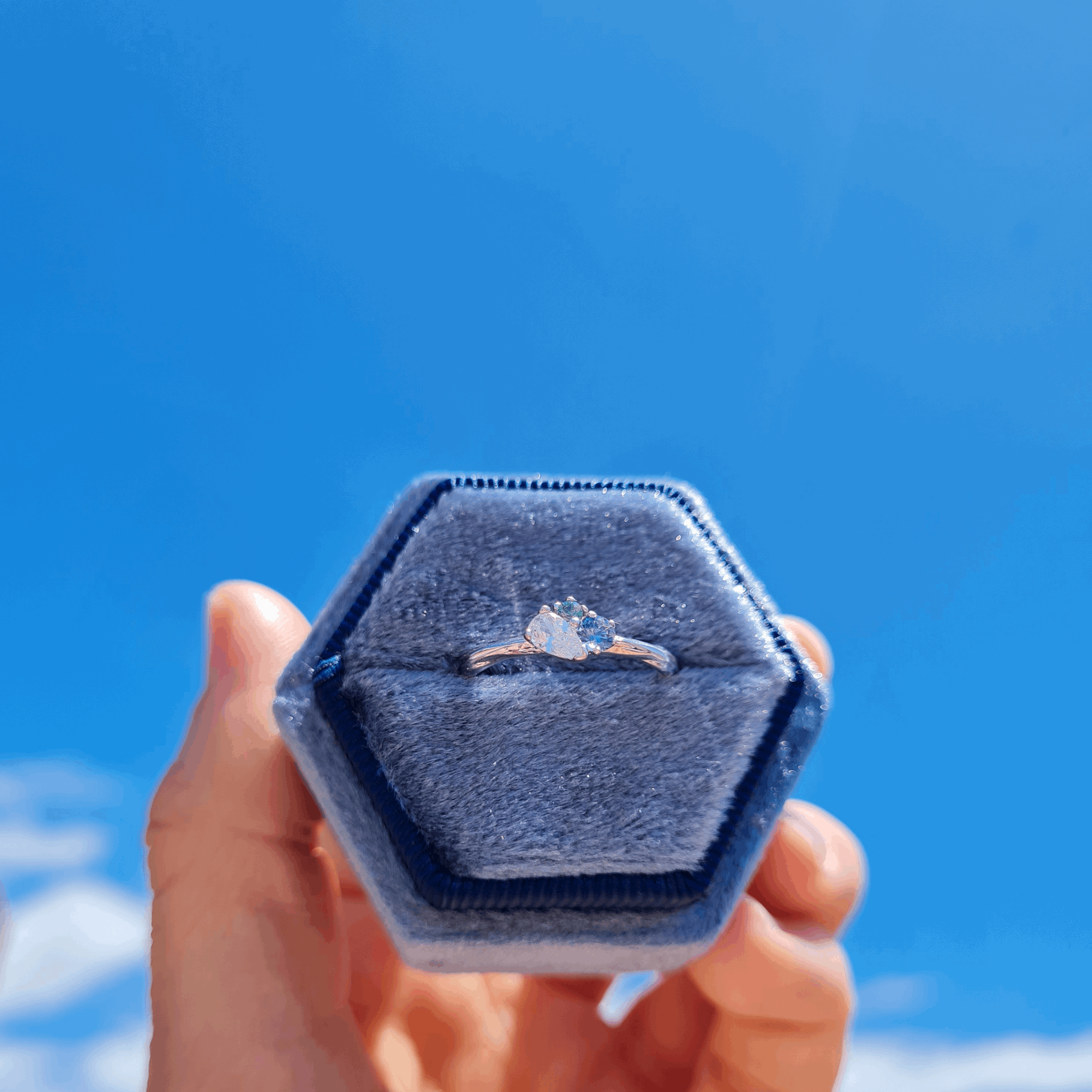 engagement ring blue sapphire green tourmaline cluster unique alternative pear diamond something different 18ct recycled white gold ethically sourced organic textured band