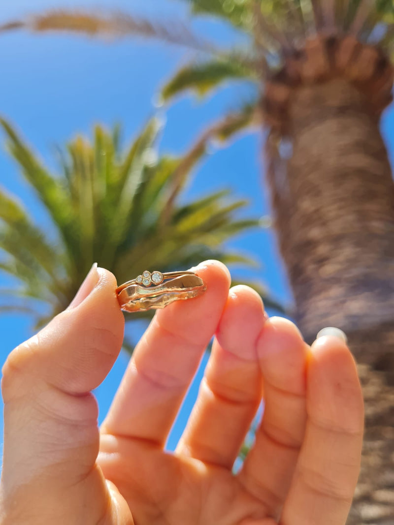 Recycled 9ct Yellow gold tiny diamond ring with melted wedding ring set blue sky sunshine palm trees set with small lab grown diamonds by Emma Hedley Jewellery Newcastle Jeweller
