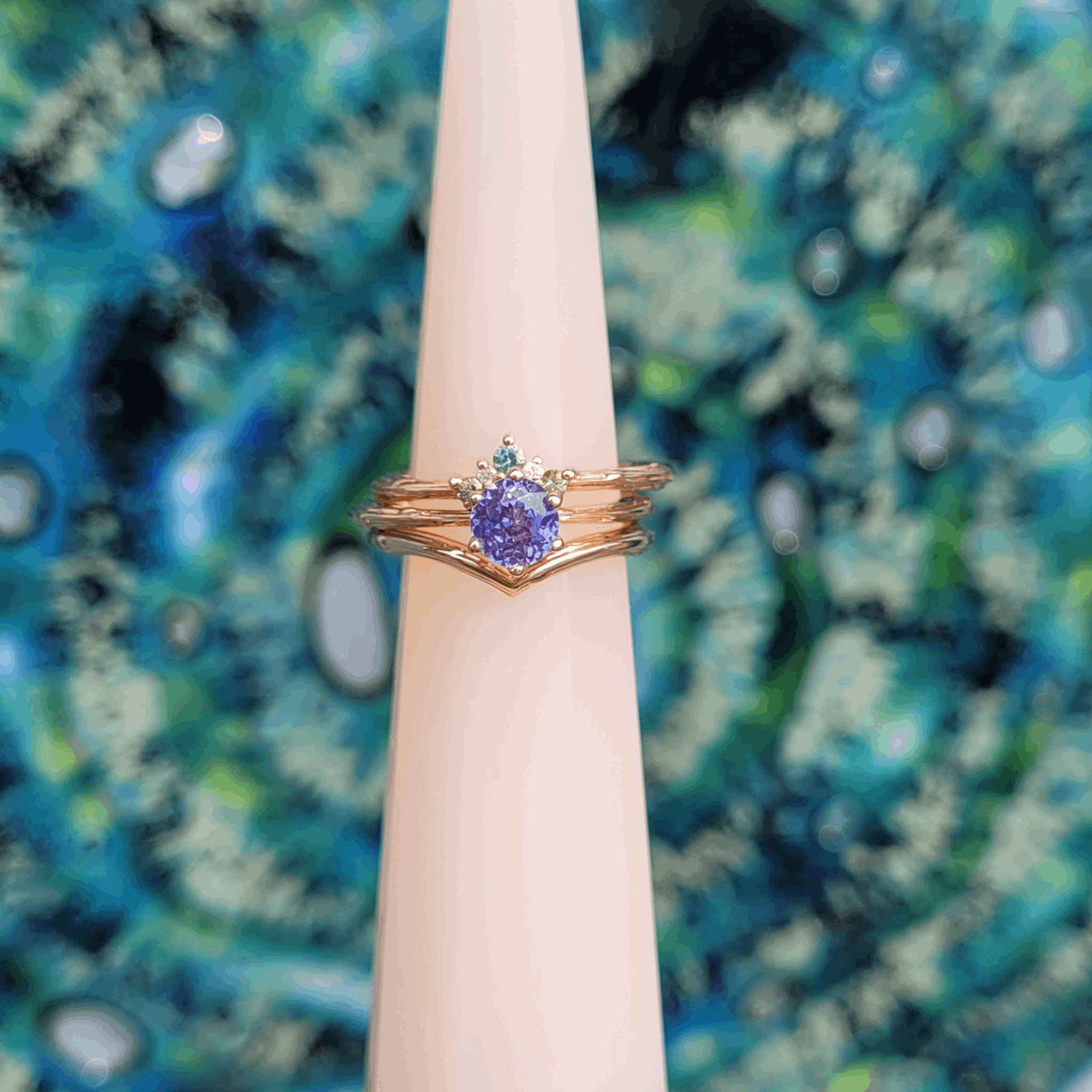 9ct Rose gold stack of 3 rings purple sapphire green tourmaline lab grown diamonds shaped wedding engagement and eternity ring set unique fine jewellery colourful gemstone jewellery by Emma Hedley inspired by nature 