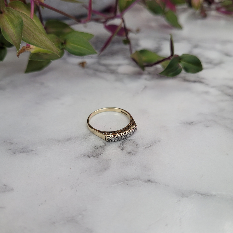 Beautiful vintage Illusion set diamond eternity ring. 9ct yellow gold with the word "Eternity" . stacking ring