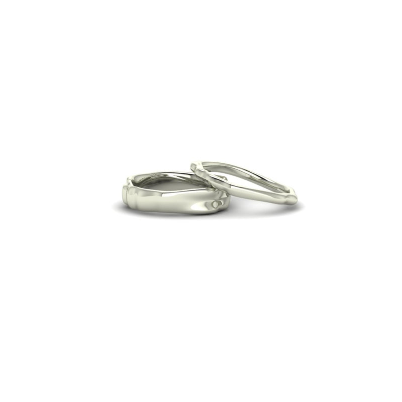 Ripple wedding rings 2mm and 5mm wide custom widths available in 18ct recycled white gold platinum or fairtrade gold unique designer rings by Emma Hedley